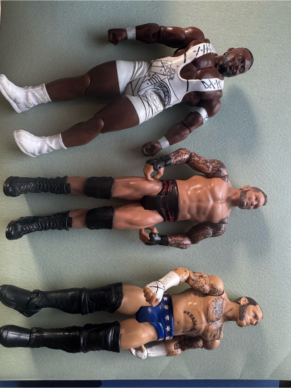 WWE Action Figure Trio in White, Black & Blue Ring Gear
